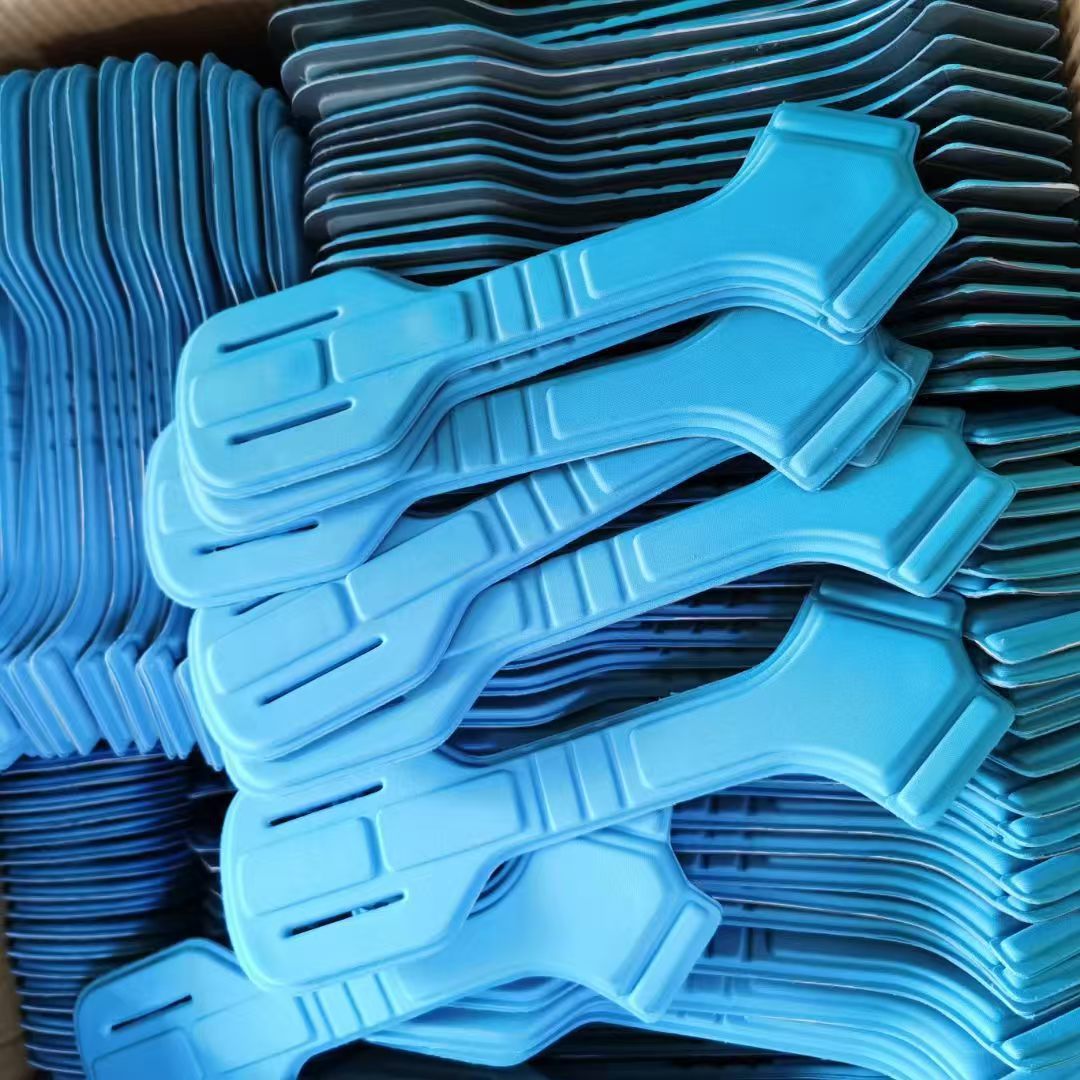 Stacked blue thermoformed protective gear pads